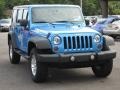 2010 Surf Blue Pearl Jeep Wrangler Unlimited Islander Edition 4x4  photo #4