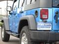 2010 Surf Blue Pearl Jeep Wrangler Unlimited Islander Edition 4x4  photo #17