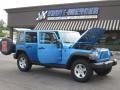 2010 Surf Blue Pearl Jeep Wrangler Unlimited Islander Edition 4x4  photo #19