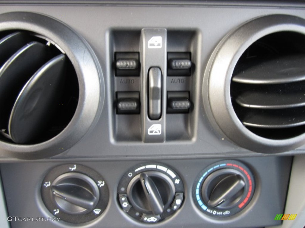 2010 Jeep Wrangler Unlimited Islander Edition 4x4 Controls Photo #67082450