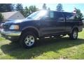 2002 True Blue Metallic Ford F150 XLT SuperCab 4x4  photo #2