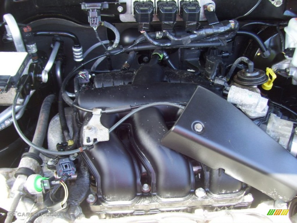 2006 Escape XLT V6 4WD - Black / Medium/Dark Flint photo #11