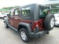 2009 Red Rock Crystal Pearl Jeep Wrangler Unlimited X 4x4  photo #3