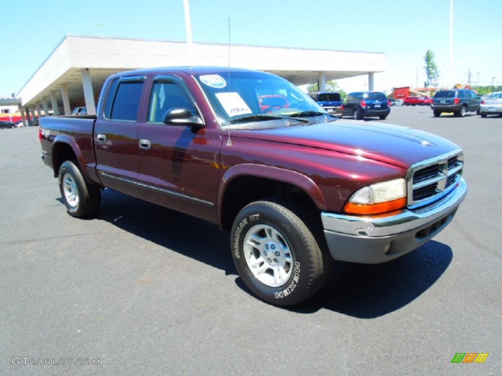 2004 Dakota SLT Quad Cab 4x4 - Deep Molten Red Pearl / Taupe photo #1