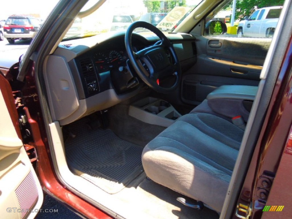 2004 Dakota SLT Quad Cab 4x4 - Deep Molten Red Pearl / Taupe photo #25