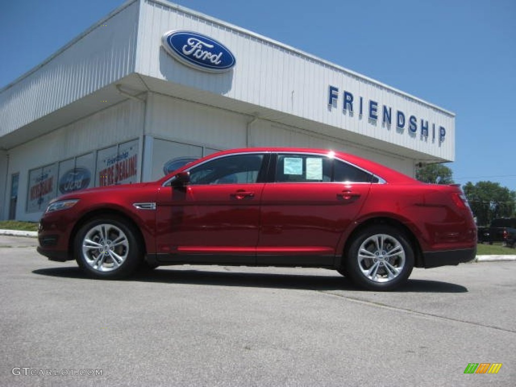 2013 Taurus SEL - Ruby Red Metallic / Charcoal Black photo #1