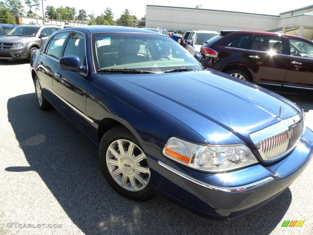 Dark Blue Pearl Metallic Lincoln Town Car