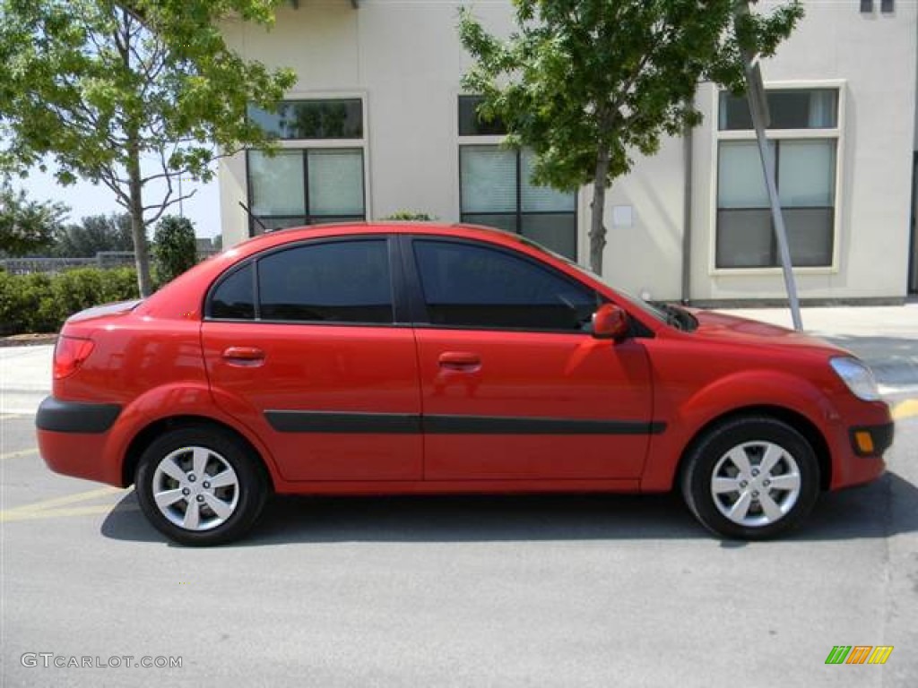 Sunset Orange 2009 Kia Rio LX Sedan Exterior Photo #67287695