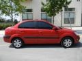 Sunset Orange 2009 Kia Rio LX Sedan Exterior