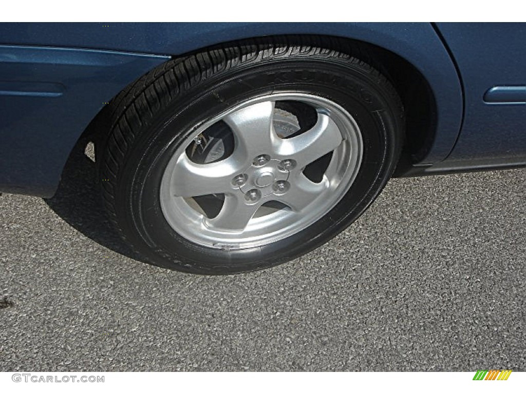 2004 Taurus SES Sedan - True Blue Metallic / Medium Parchment photo #5
