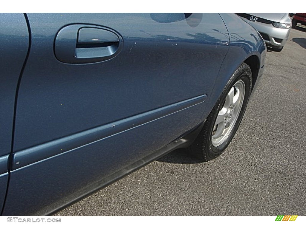 2004 Taurus SES Sedan - True Blue Metallic / Medium Parchment photo #10