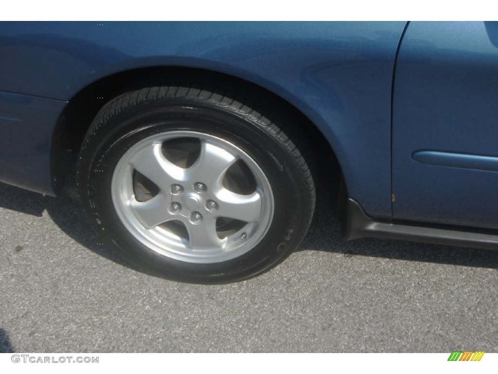 2004 Taurus SES Sedan - True Blue Metallic / Medium Parchment photo #33