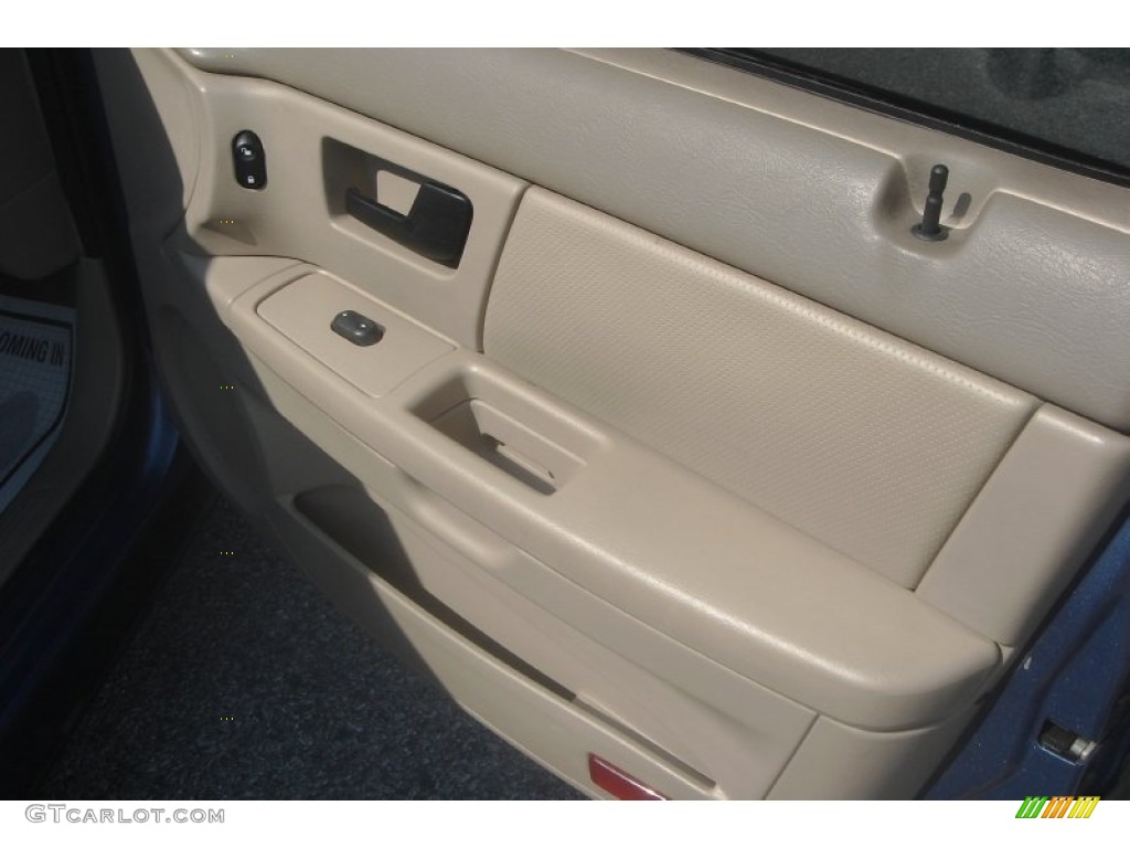 2004 Taurus SES Sedan - True Blue Metallic / Medium Parchment photo #37