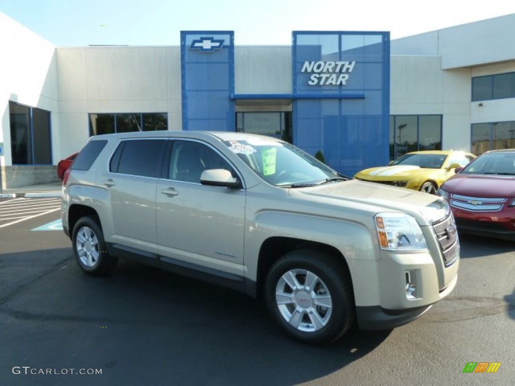 2011 Terrain SLE AWD - Gold Mist Metallic / Jet Black photo #1