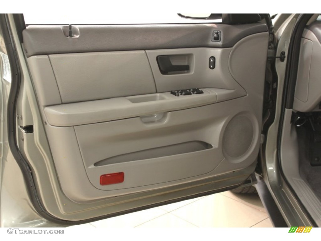 2004 Ford Taurus SE Wagon Medium Graphite Door Panel Photo #67340960