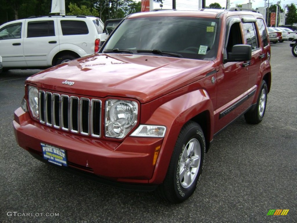 2009 Liberty Sport 4x4 - Sunburst Orange Pearl / Dark Slate Gray photo #1