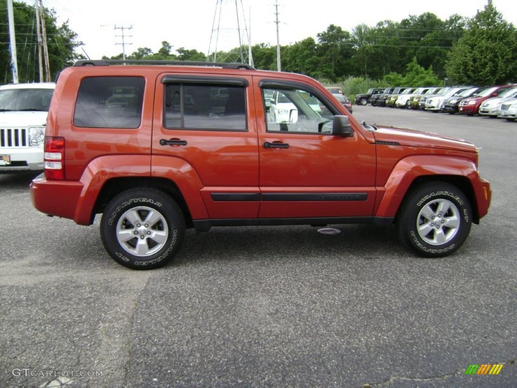 2009 Liberty Sport 4x4 - Sunburst Orange Pearl / Dark Slate Gray photo #7