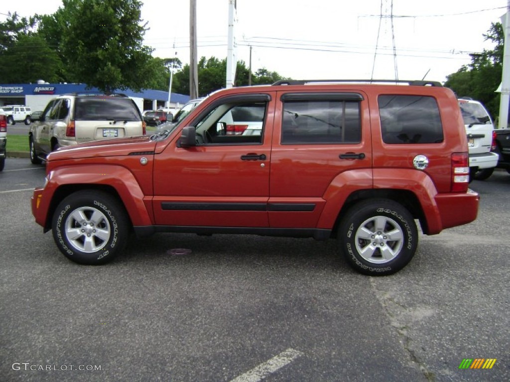 2009 Liberty Sport 4x4 - Sunburst Orange Pearl / Dark Slate Gray photo #9