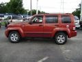 2009 Sunburst Orange Pearl Jeep Liberty Sport 4x4  photo #9