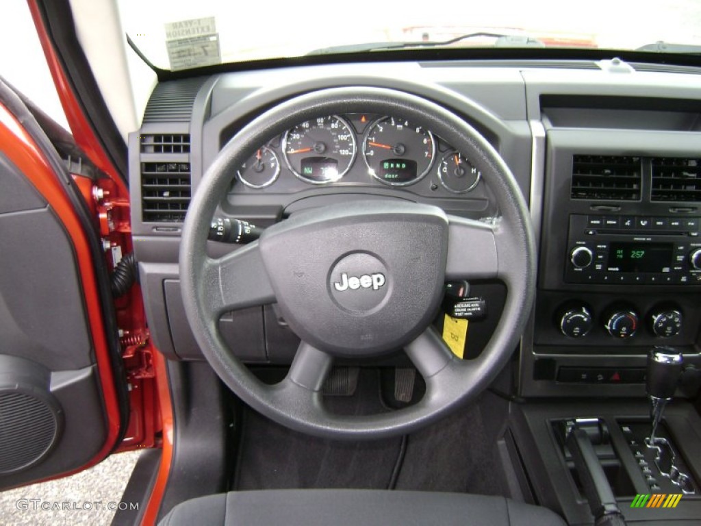 2009 Liberty Sport 4x4 - Sunburst Orange Pearl / Dark Slate Gray photo #13