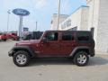 2010 Red Rock Crystal Pearl Jeep Wrangler Unlimited Rubicon 4x4  photo #2