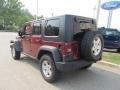 2010 Red Rock Crystal Pearl Jeep Wrangler Unlimited Rubicon 4x4  photo #3