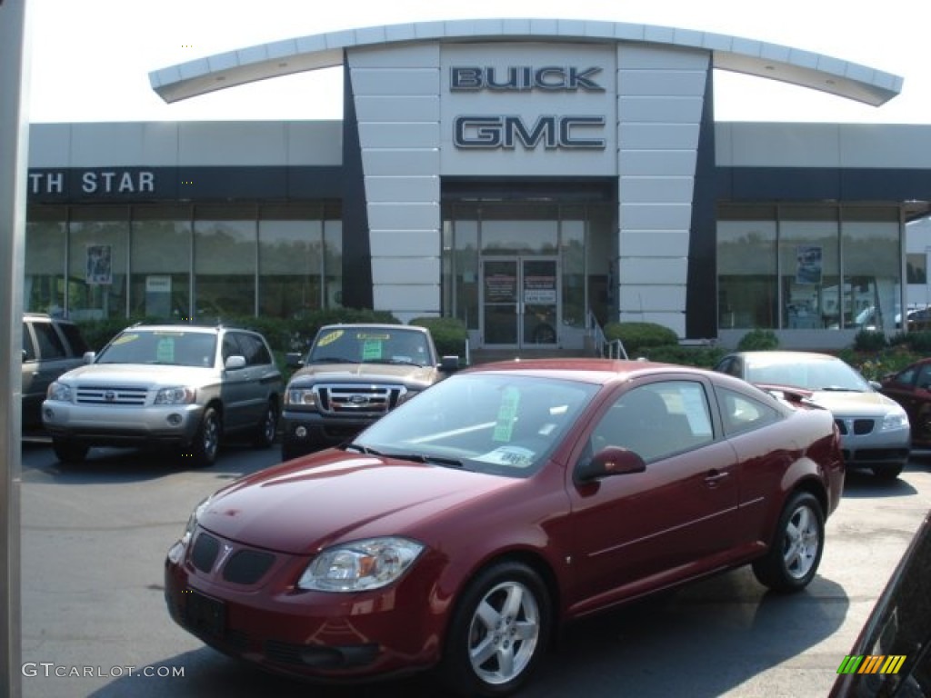 2009 G5  - Performance Red Tintcoat / Ebony photo #1