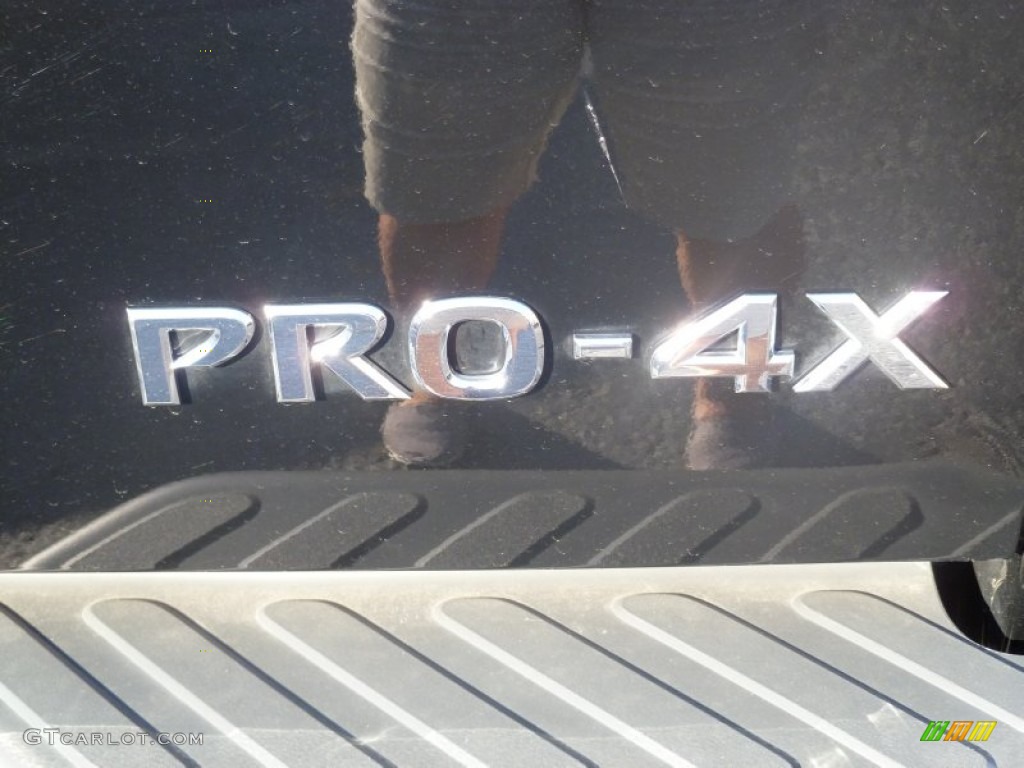 2011 Frontier Pro-4X Crew Cab 4x4 - Super Black / Pro 4X Graphite/Red photo #7