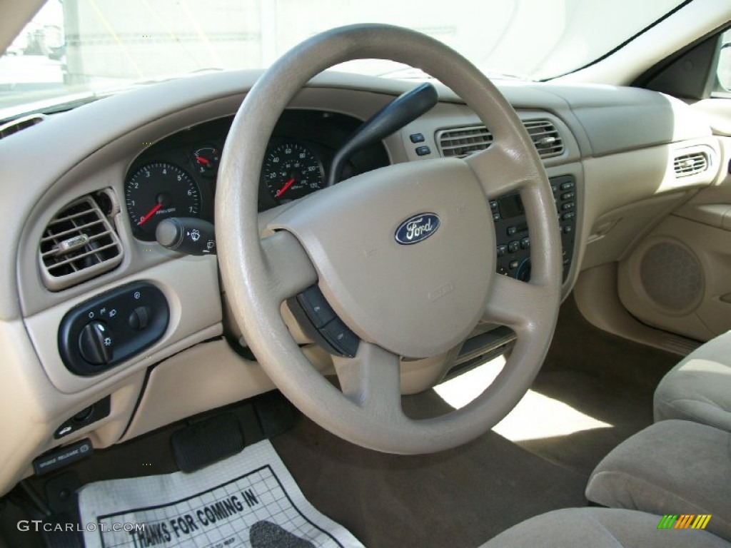 2006 Ford Taurus SE Medium/Dark Pebble Beige Steering Wheel Photo #67469479