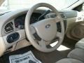 Medium/Dark Pebble Beige Steering Wheel Photo for 2006 Ford Taurus #67469479