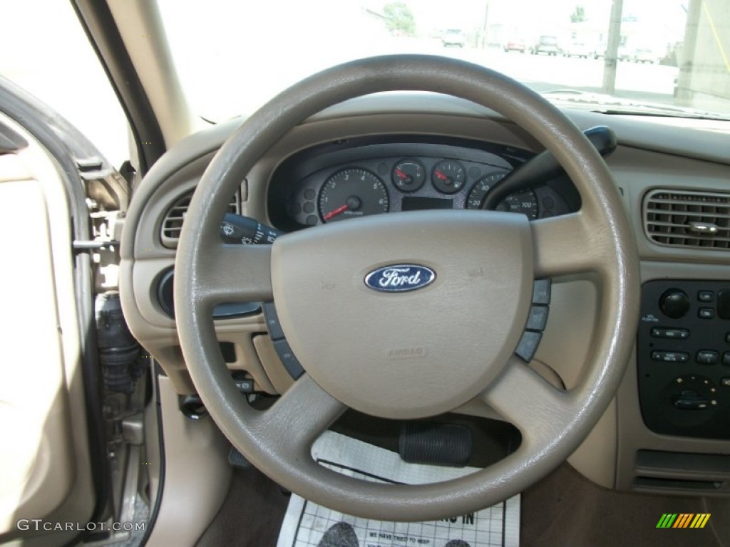2006 Ford Taurus SE Medium/Dark Pebble Beige Steering Wheel Photo #67469527