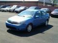 2010 Blue Flame Metallic Ford Focus SE Coupe  photo #4