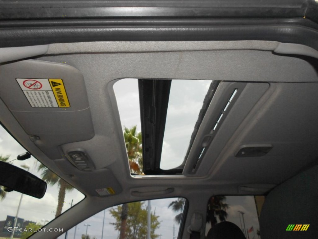 2003 Protege 5 Wagon - Vivid Yellow / Off Black photo #26