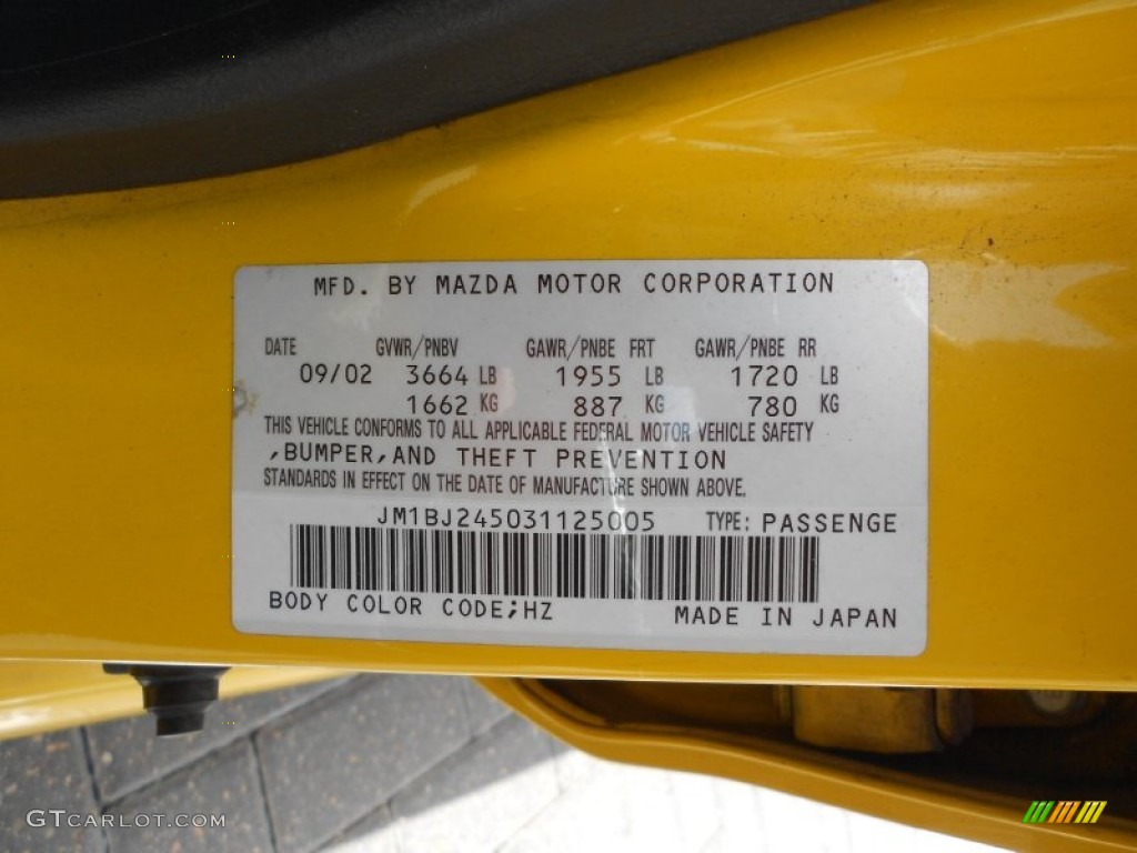 2003 Protege 5 Wagon - Vivid Yellow / Off Black photo #27