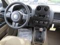 2012 Jeep Patriot Dark Slate Gray/Light Pebble Beige Interior Dashboard Photo