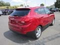 Garnet Red - Tucson GLS AWD Photo No. 7