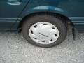 1995 Ford Taurus GL Sedan Wheel and Tire Photo