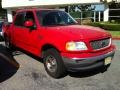 2003 Bright Red Ford F150 XLT SuperCrew  photo #1