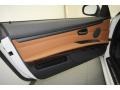 Saddle Brown Dakota Leather Door Panel Photo for 2010 BMW 3 Series #67643589