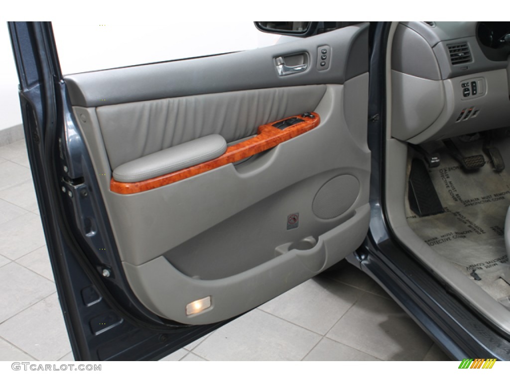 2007 Toyota Sienna XLE Limited AWD Stone Door Panel Photo #67678867