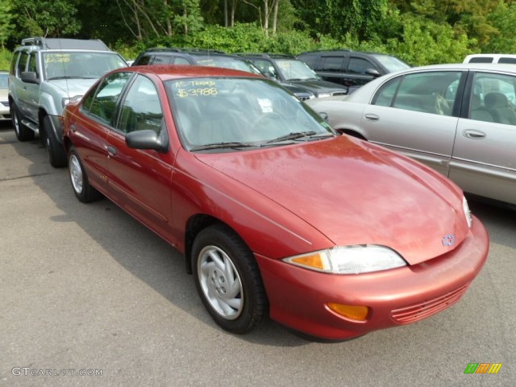 1998 Cavalier Sedan - Cayenne Red Metallic / Graphite photo #1