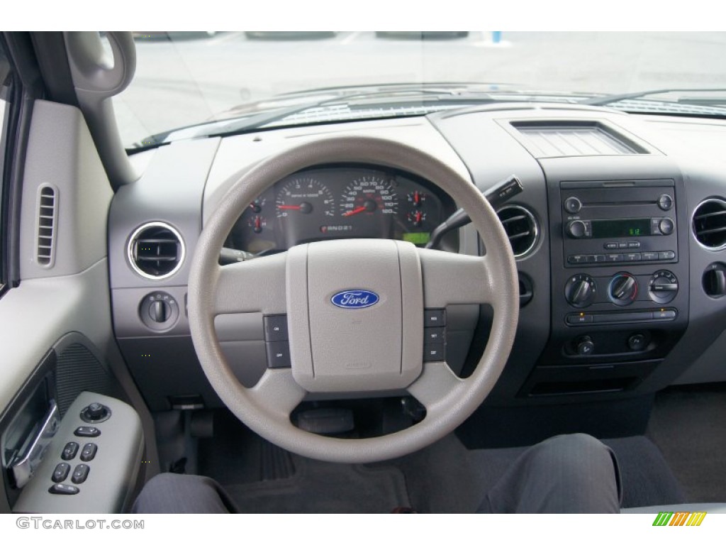 2005 Ford F150 XLT SuperCab Medium Flint Grey Steering Wheel Photo #67702246