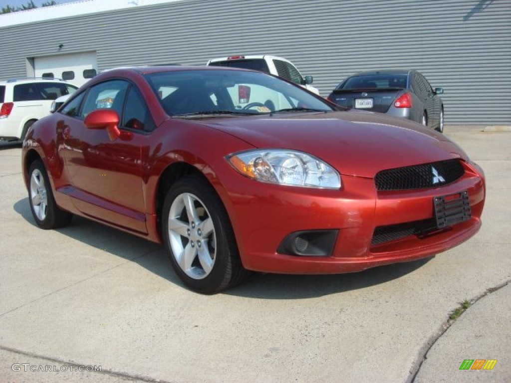 2009 Eclipse GS Coupe - Sunset Pearlescent Pearl / Terra Cotta/Charcoal photo #1