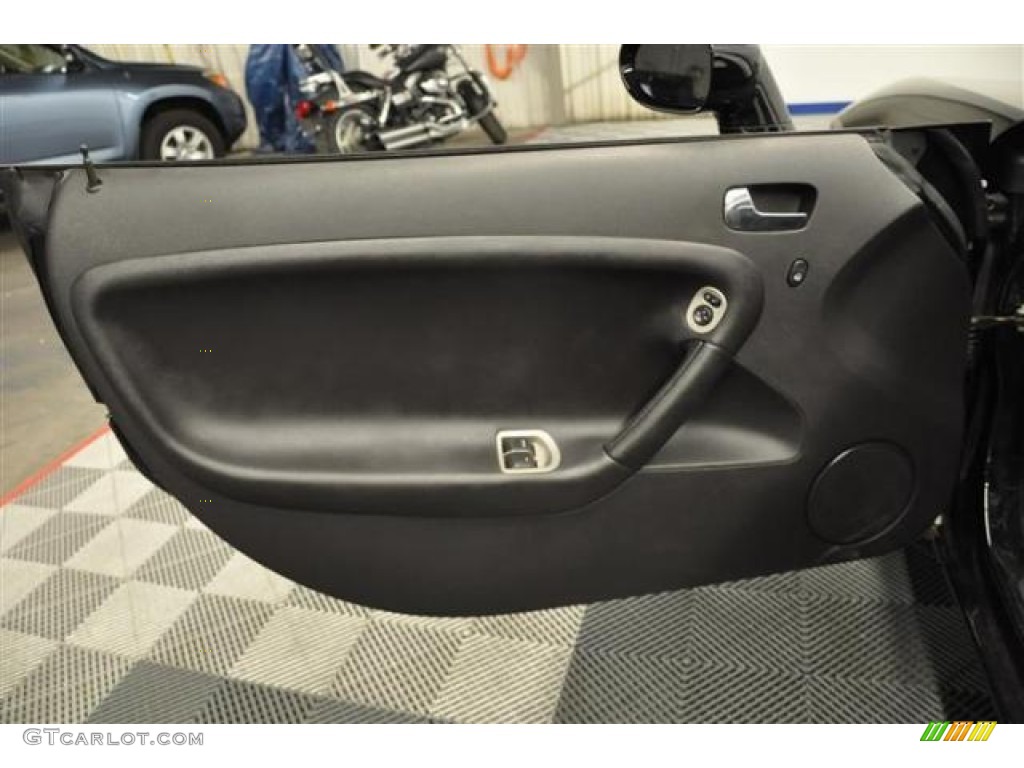 2007 Pontiac Solstice GXP Roadster Ebony Door Panel Photo #67736771