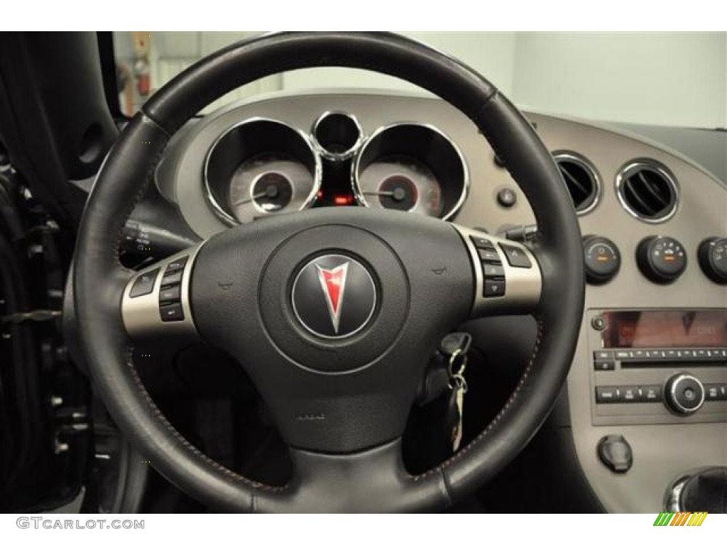 2007 Pontiac Solstice GXP Roadster Ebony Steering Wheel Photo #67736798