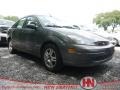 2003 Liquid Grey Metallic Ford Focus SE Sedan  photo #1