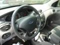 2003 Liquid Grey Metallic Ford Focus SE Sedan  photo #6