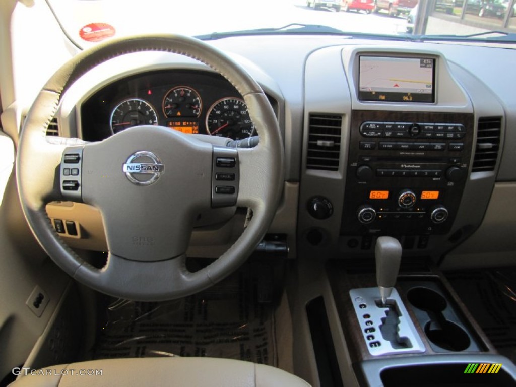 2009 Nissan Titan LE Crew Cab 4x4 Almond Dashboard Photo #67748564