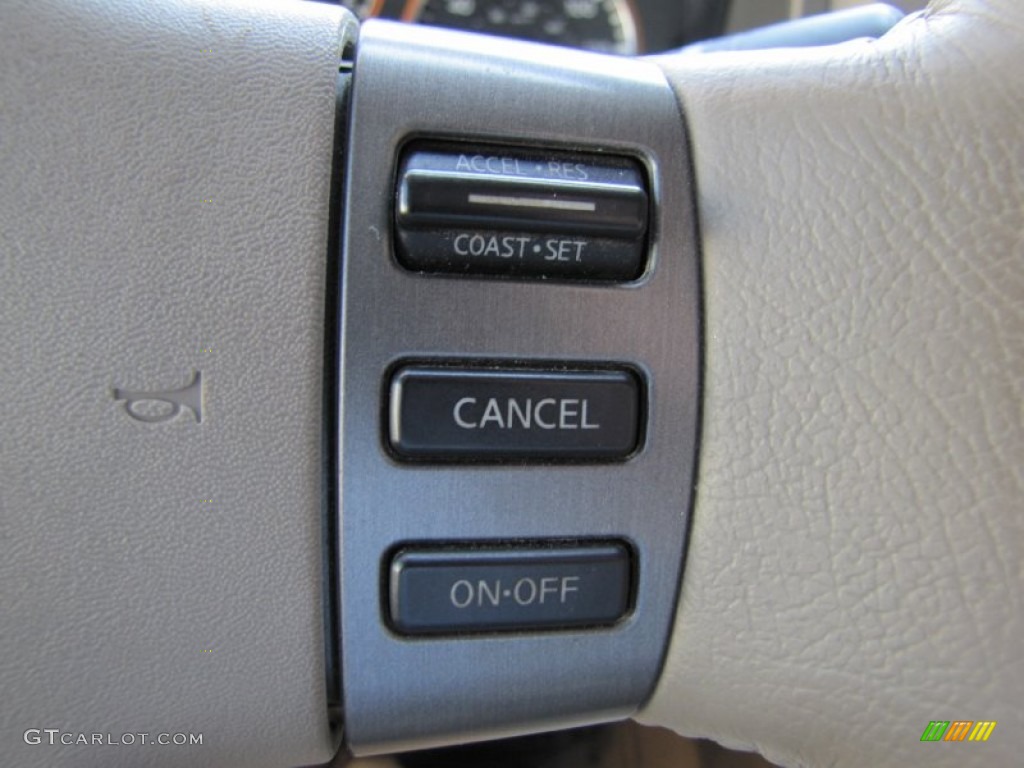 2009 Nissan Titan LE Crew Cab 4x4 Controls Photo #67748612