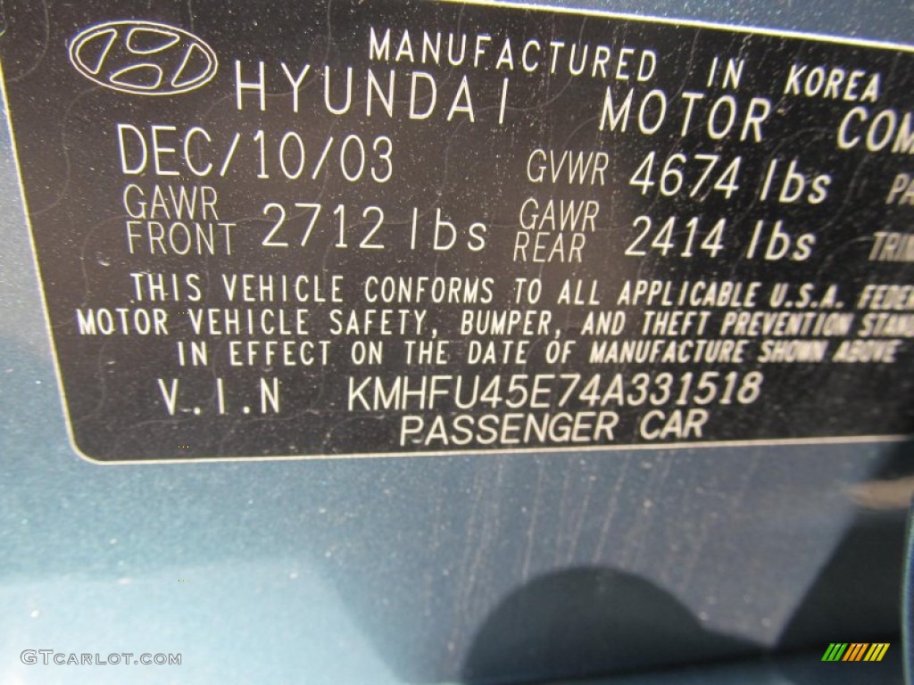 2004 XG350 L Sedan - Celadon Green Metallic / Black photo #14